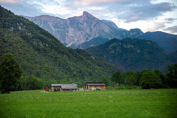 Farm in front of mountains