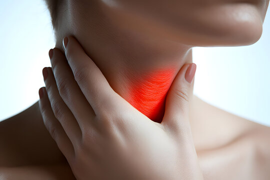 Gentle hand placed on the neck shows signs of discomfort in a serene wellness setting