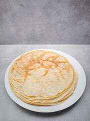 Stack of pancakes celebrating shrove tuesday, maslenitsa or breakfast in prague copy space