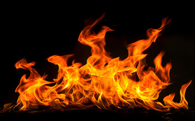 Fototapeta premium Fire flames isolated on a black background