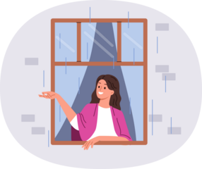 First autumn rain brings joy to woman looking out of apartment window and catching drops with smile. Happy girl enjoying view of street during rain, standing with blanket on shoulders in cozy home