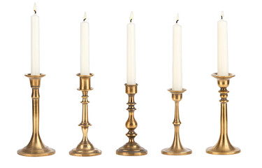 Five ornate brass candle holders with lit taper candles on transparent background