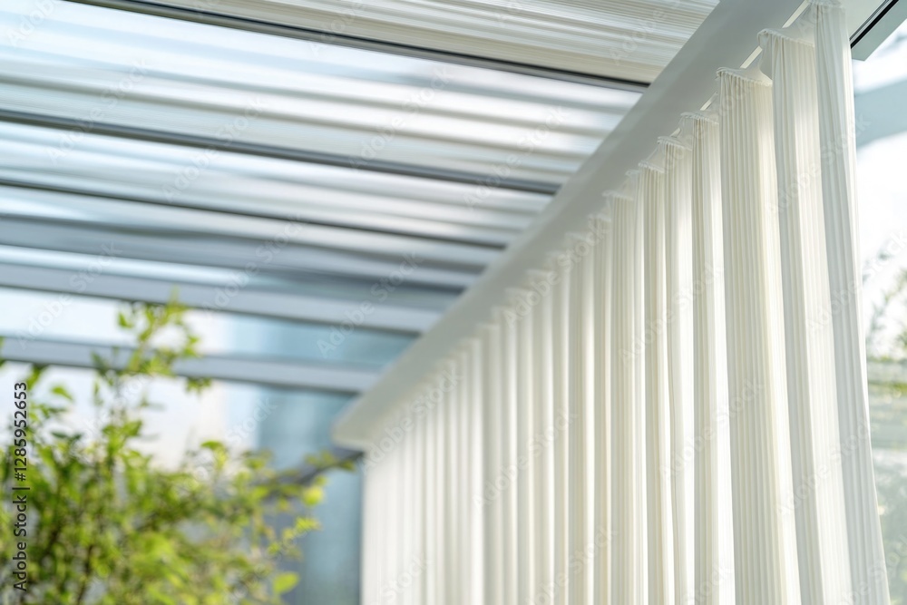 Poster a close-up view of a window with white curtains, ideal for interior design or architecture uses