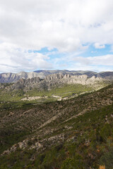  The mountain panorama opening from the hiking path to pick Puig Campana, Finestrat, Benidorm, Spain