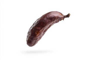 Obraz premium A single hot pepper sits on a white background