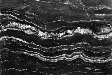 Obraz premium Natural black marble stone texture with smooth veining, ideal for high-end design or architecture projects.