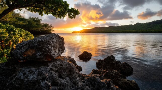 Guam History And Chamorro Heritage Day Glorious sunset over tropical ocean with rocky shore and lush foliage