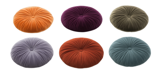 Collection of six round velvet pillows in various colors on transparent background