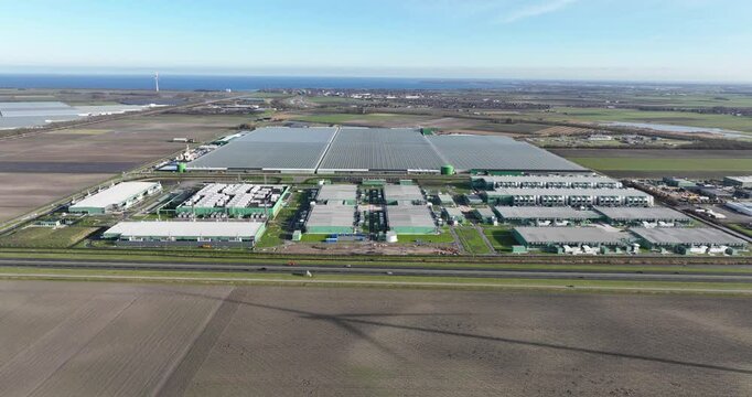 Hyperscaler, data center, global computing, massive workloads, infrastructure for modern cloud computing. Aerial drone view.