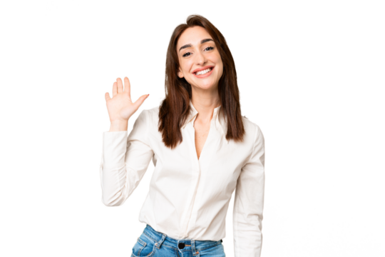 Young caucasian woman over isolated chroma key background saluting with hand with happy expression