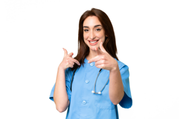 Young nurse woman over isolated chroma key background pointing to the front and smiling