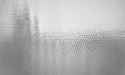 Textured background featuring a fine, woven pattern with subtle gradients of white and gray light.