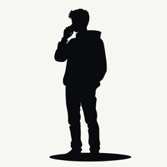 Silhouette of a man standing and talking on the phone, wearing casual clothes, against a plain background.