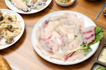 Korean seafood dish. raw fish Sashimi