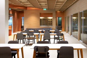 Large room with many chairs and tables