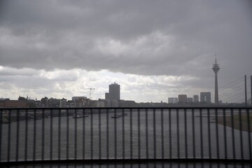 Naklejka premium View from the bridge over the river to the business districts of the European metropolis