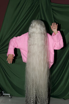 Elderly Person Showing Long, Flowing White Hair