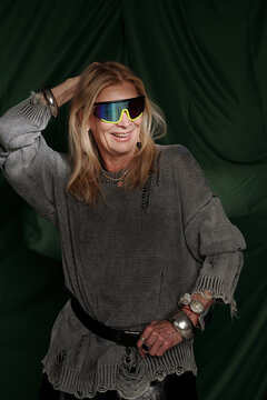 Portrait of Stylish Senior Woman Wearing Trendy Sunglasses