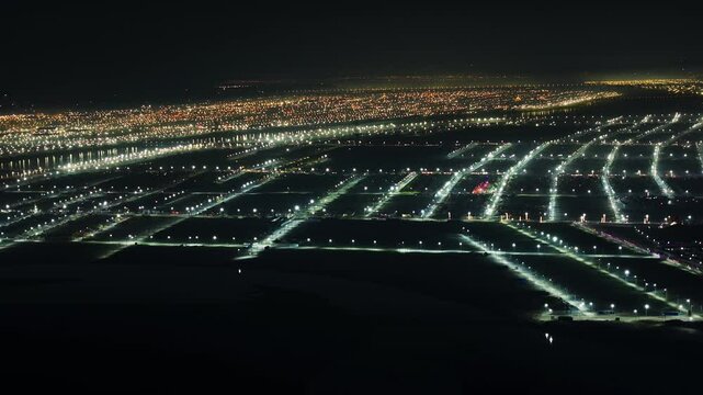 Night aerial view of Prayagraj, India during Maha Kumbh. Kumbh Mela is the most important event, where millions of devotees, including Sadhu take a sacred holy dip in Ganga.