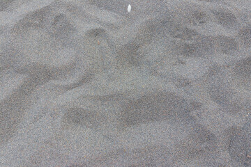 Texture of black volcanic sand for background
