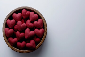 Wooden Bowl Filled with Red Hearts on White Background