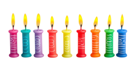 Colorful birthday candles arranged in a cheerful pattern ready for celebration during a festive gathering