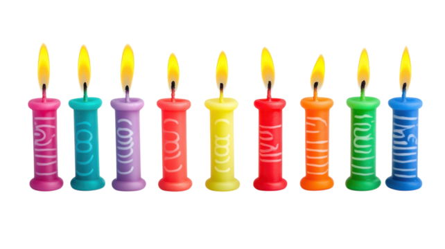 Colorful birthday candles arranged in a cheerful pattern ready for celebration during a festive gathering