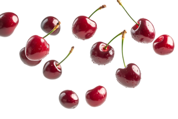 Juicy red cherries falling on black background.