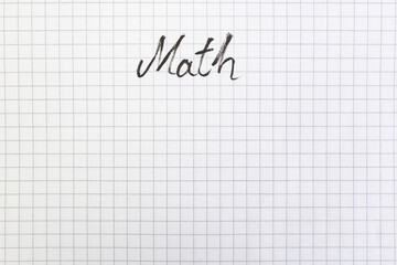 Chequered pattern empty page, mathematics copybook page , with math word hand written, abstract textured backdrop