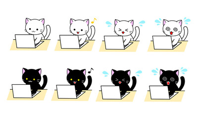 PCで仕事をする白猫と黒猫