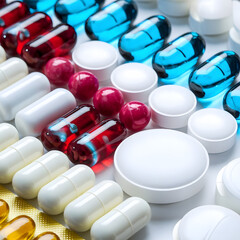 Vibrant Collection of Multicolored Pills and Capsules in Focus. Colorful medicines and tablets. Clean and bright medicine image.