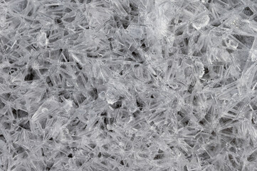 Frozen stream and ice closeup photo. Beautiful winter abstract background in nature. Concept for water and winter time.