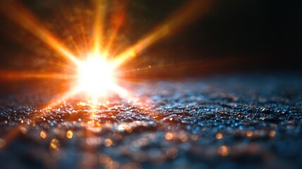 Sunrise on a textured surface with light rays