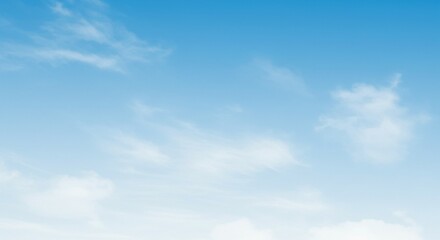 Obraz premium Serene Blue Sky with Delicate White Clouds Peaceful Nature Background Image