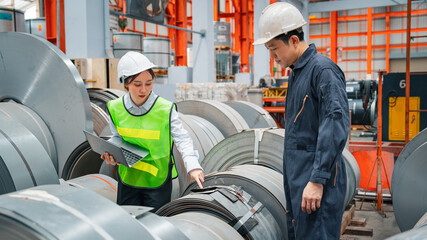 Professional expertise engineering and inspector of Mechanic are checking or examining the quality of Plate rolling metal sheet with order of industry or factory, Rolling machine quality control.