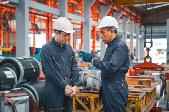 Professional engineering manager is discussing or complaining about the quality's error or mistake of Plate rolling order or metal sheet production of his co-worker. Concept of failure in factory.