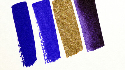 Fototapeta premium Vibrant brush strokes of blue and gold paint on textured paper showcasing artistic creativity