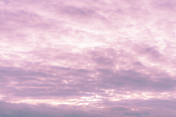 Obraz premium Pink sunset sky background, A Serene and Beautiful Sunset Sky Displaying Soft Pink and Purple Hues at Dusk, Truly Stunning