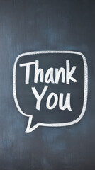A chalkboard features a speech bubble with the words "Thank You" written in white chalk, conveying gratitude and appreciation.