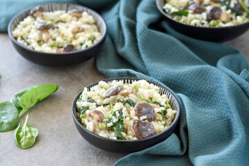 Mushroom Risotto with Baby Spinach and Peas