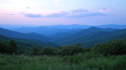 Fototapeta premium Scenic Mountain Range Landscape at Dusk with Rolling Hills and Sky