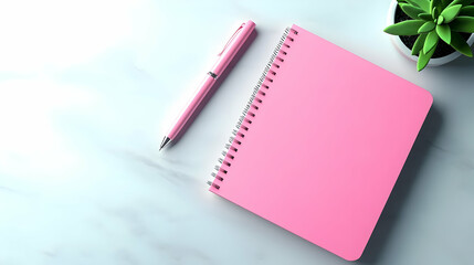 A vibrant pink notebook and pen on a marble background, perfect for creative notes and ideas.