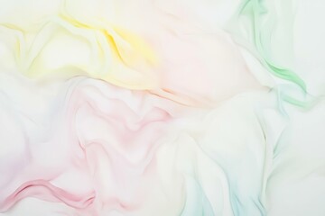 Obraz premium Soft pastel colors in flowing fabric, showcasing delicate shades of yellow, pink, and green, perfect for seasonal design themes or backgrounds