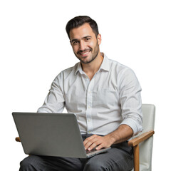A man in a white shirt is seated on a chair with his laptop, smiling at the camera.