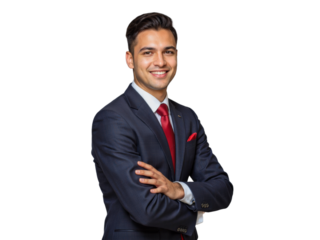 A confident young man in a tailored navy blue suit with a white shirt, red tie, and black shoes stands confidently against a transparent background