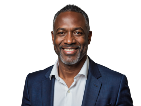 A middle-aged man wearing a blue suit and white shirt is smiling at the camera against a transparent background