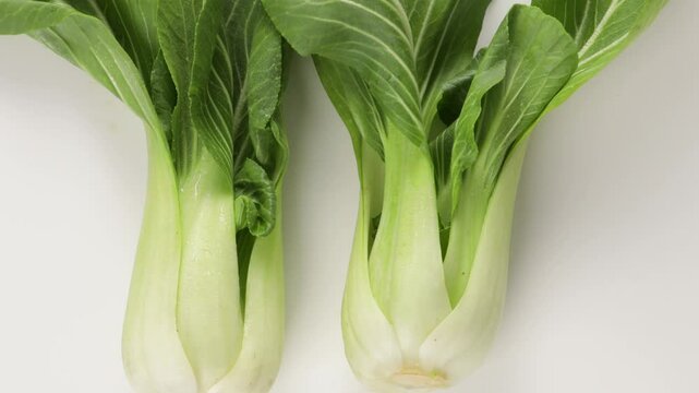 top view of chinese cabbage pak choi on light surface zoom food