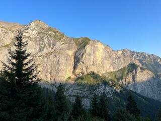 Rocky alpine peaks above Lake Melchsee or Melch Lake in the Uri Alps mountain massif, Kerns - Canton of Obwalden, Switzerland (Kanton Obwald, Schweiz)