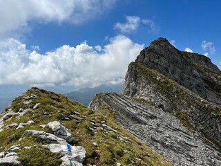 Rocky alpine peaks above Lake Melchsee or Melch Lake in the Uri Alps mountain massif, Kerns - Canton of Obwalden, Switzerland (Kanton Obwald, Schweiz)