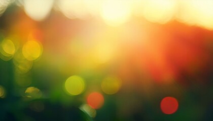 Blurred abstract background with warm orange and cool green tones, red light leaks, and bright sunlight , abstract
